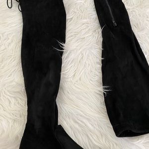 Black thigh high boots